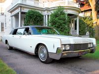 A 1966 Lincoln Lehmann-Peterson limousine resumes its role as an exclusive cruiser