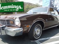 It's brown as brown can be, but it's also what's inside that makes this 1974 Mercury Comet four-door such a peach