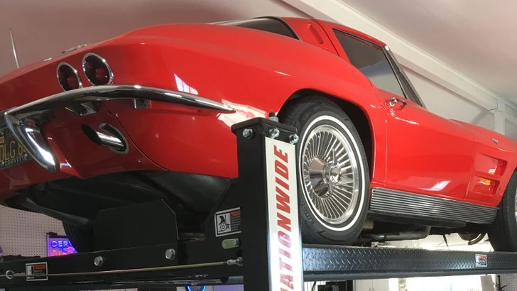 How a lift and a bathroom turned a one-car garage into one reader's automotive happy place