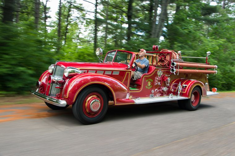 Fighting Fire In Style 1938 Packard Super Eight Fire Engine Hemmings Dennis fire engine classic commercial vehicle advert.